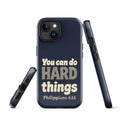 Navy tough iPhone case with a glossy finish, printed with “You can do HARD things” in cracked stone letters and Philippians 4:13