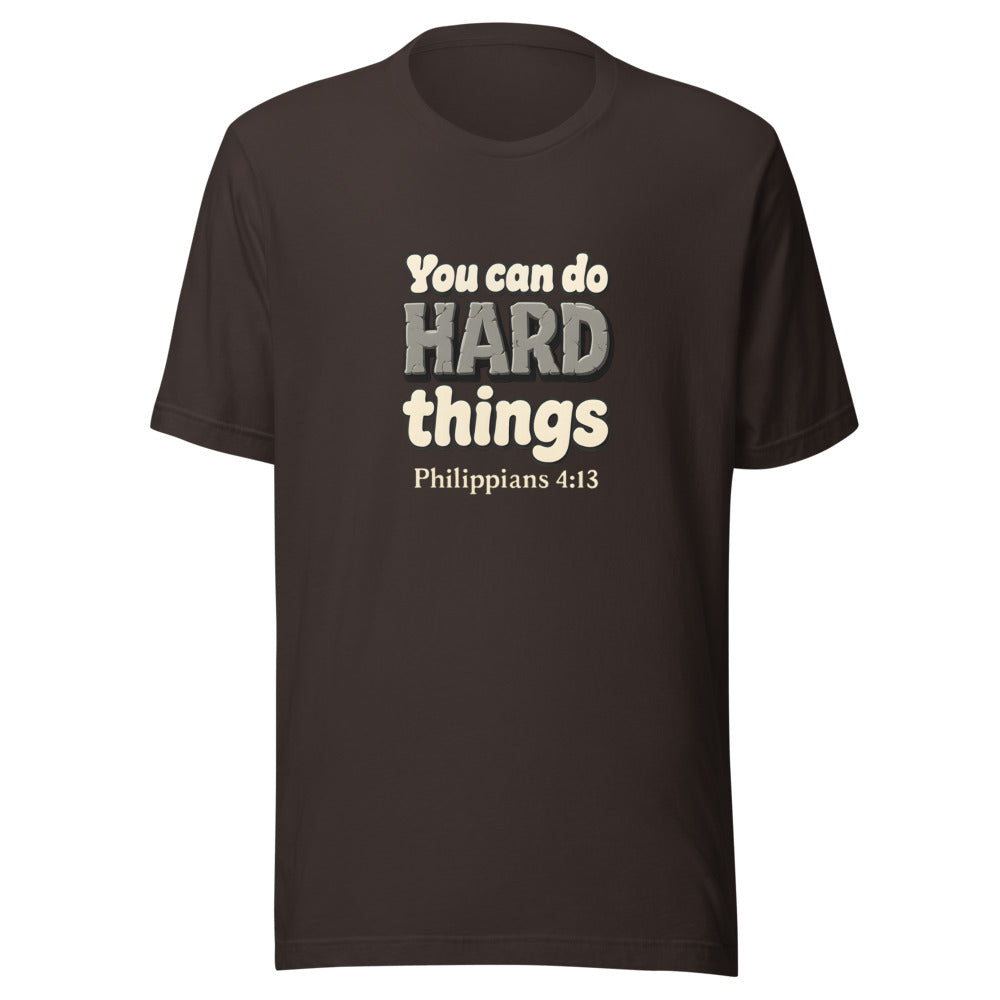 Brown t-shirt printed with “You can do HARD things” in cracked stone letters and Philippians 4:13