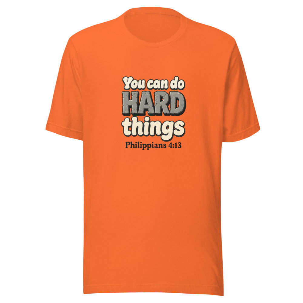 Orange t-shirt printed with “You can do HARD things” in cracked stone letters and Philippians 4:13