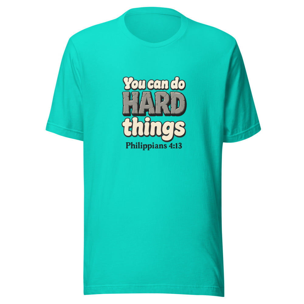 Teal t-shirt printed with “You can do HARD things” in cracked stone letters and Philippians 4:13