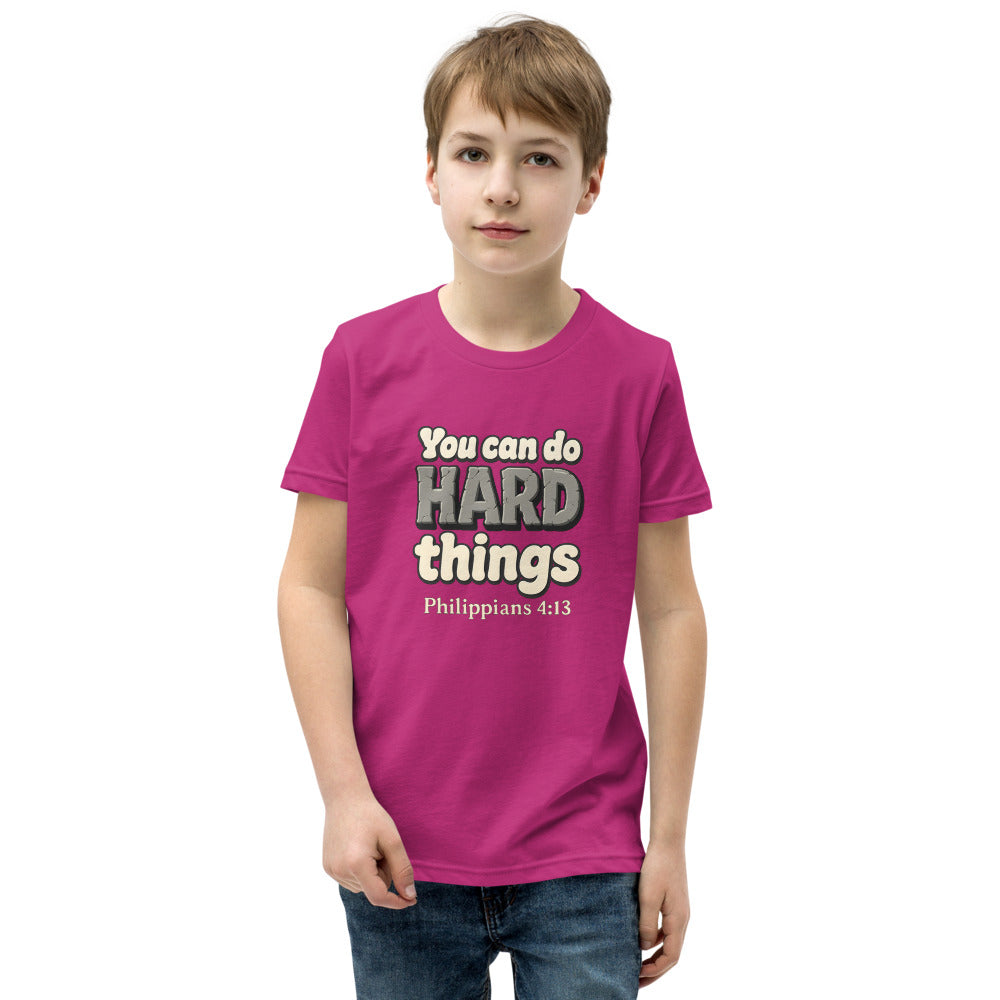 Berry youth t-shirt printed with “You can do HARD things” in cracked stone letters and Philippians 4:13