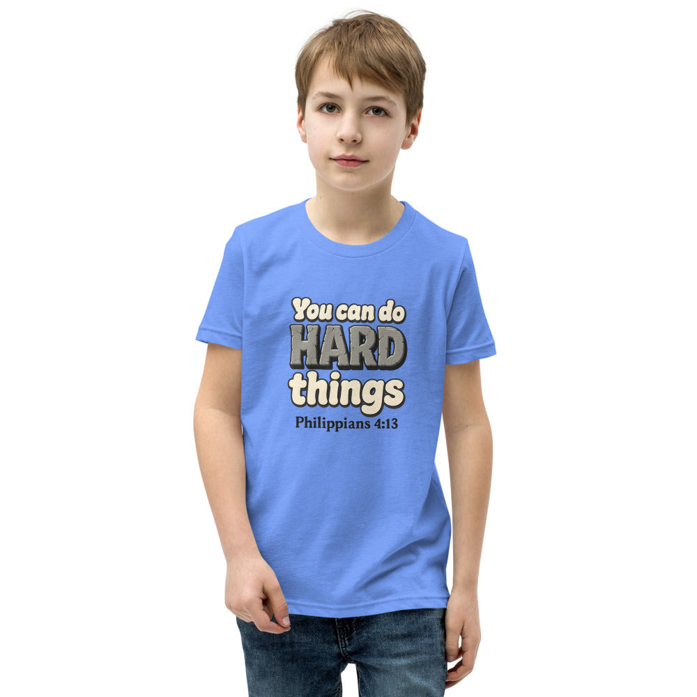 Heather Columbia Blue youth t-shirt printed with “You can do HARD things” in cracked stone letters and Philippians 4:13