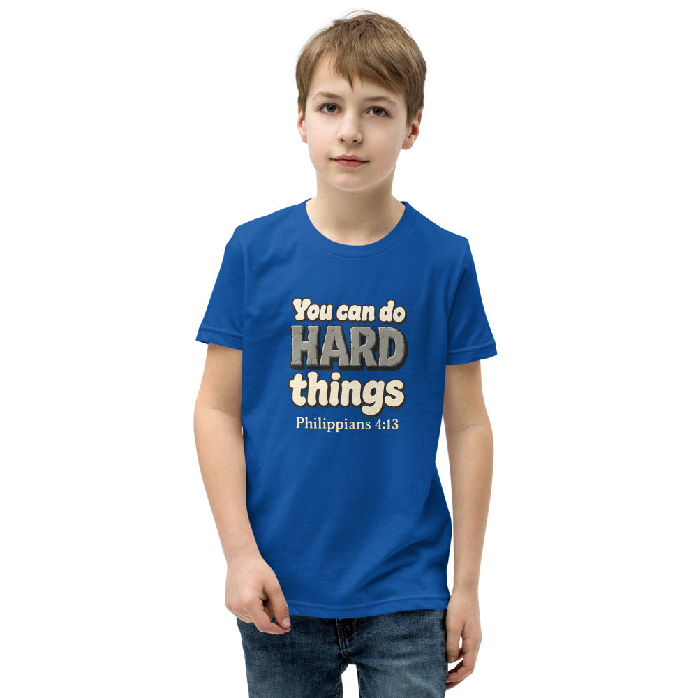 True Royal youth t-shirt printed with “You can do HARD things” in cracked stone letters and Philippians 4:13